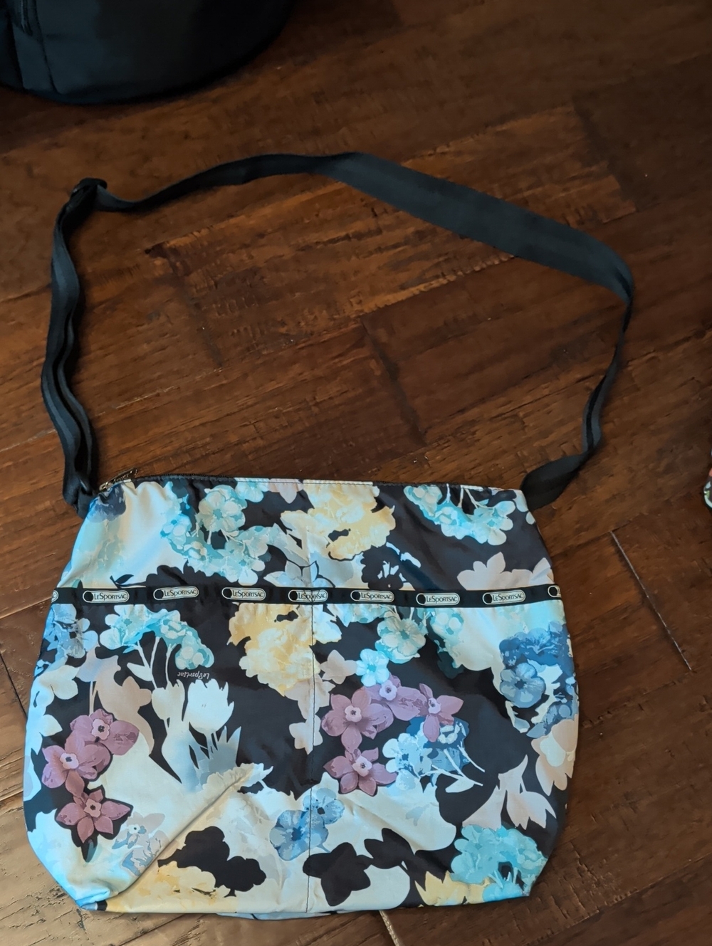 Lesportsac Black Floral Shoulder Bag with Blue, Yellow, Pink Accents